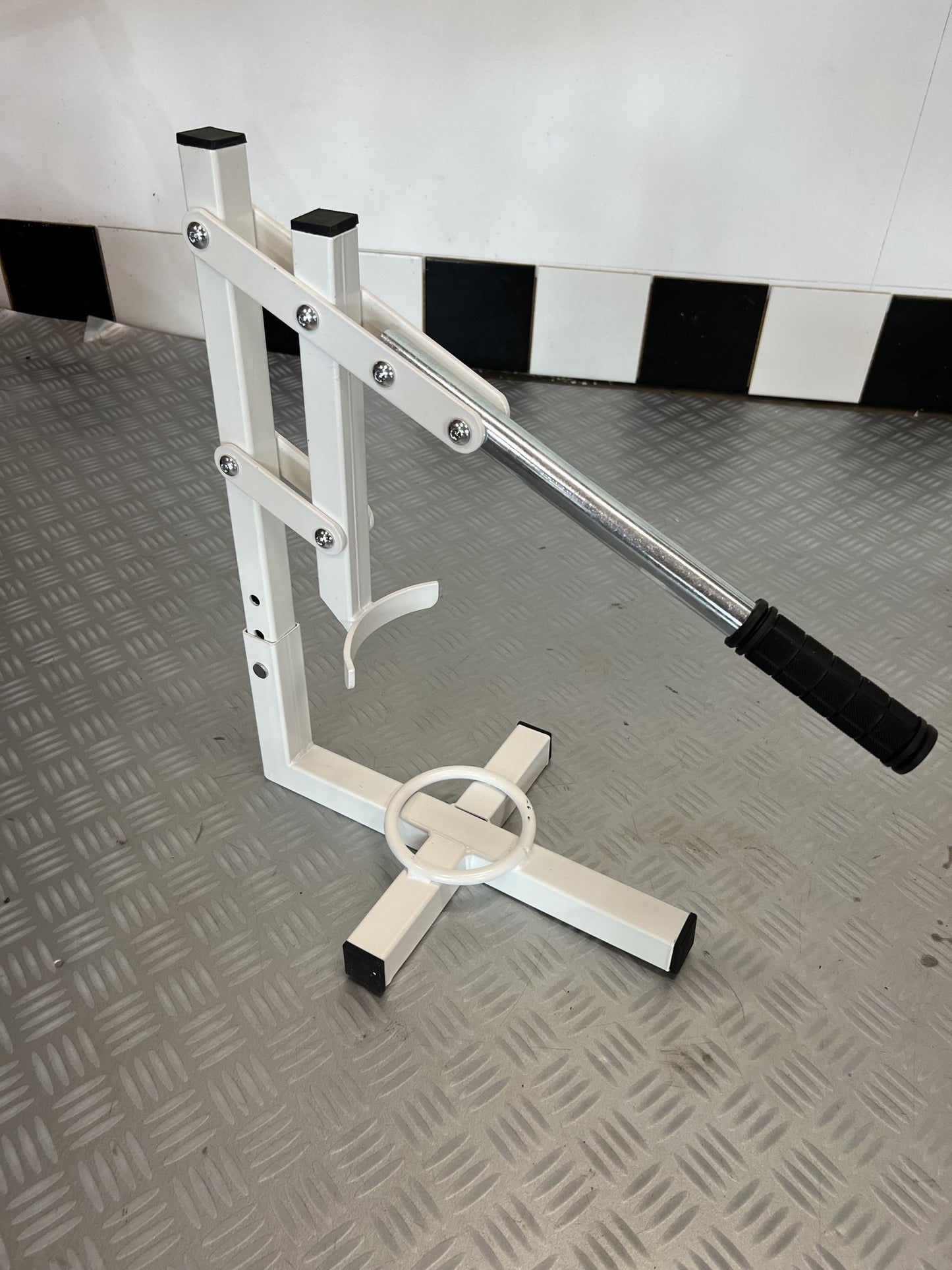 Presse à pneus pliable
