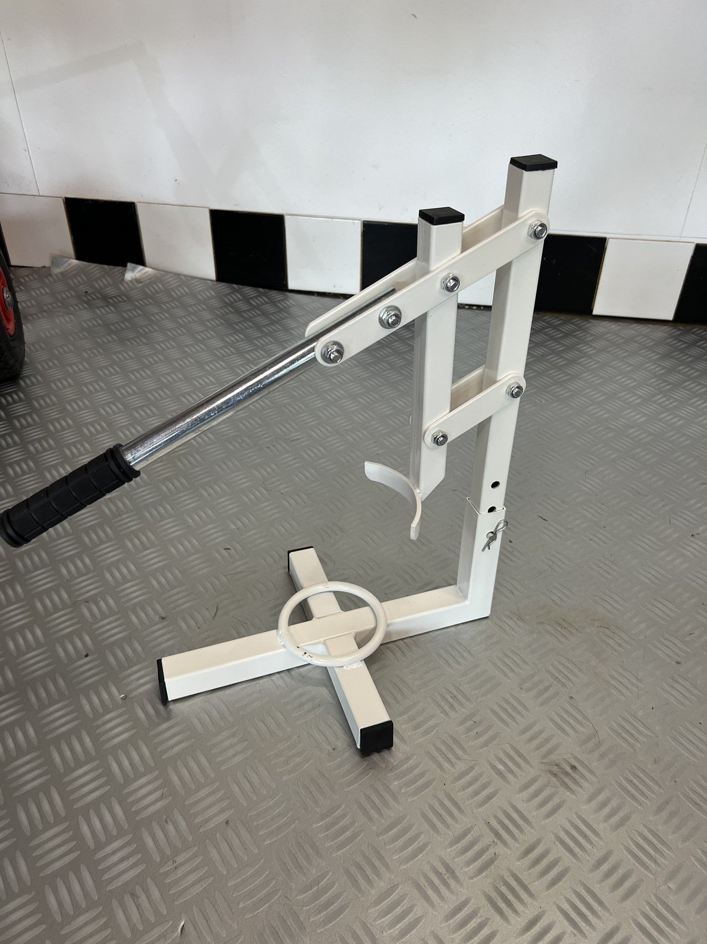 Presse à pneus pliable